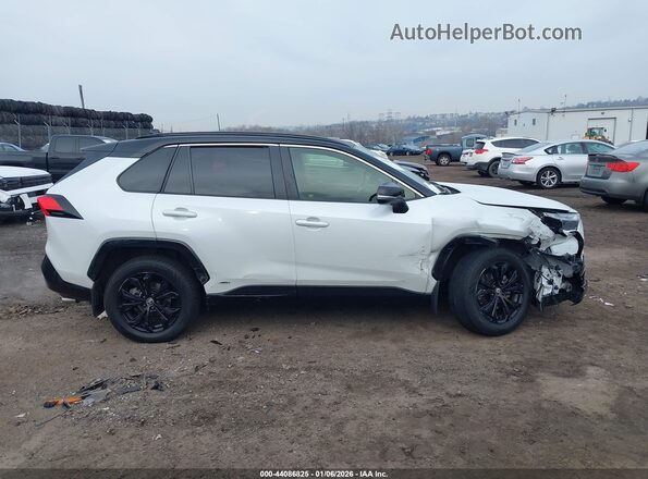 JTME6RFV9PJ035958 2023 TOYOTA RAV4 HYBRID White Widok wnętrza z tyłu