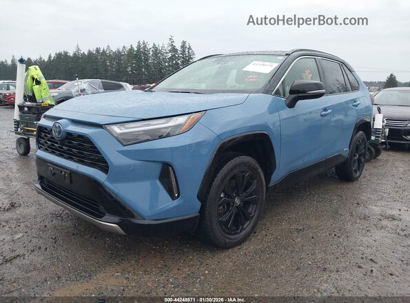 JTME6RFVXND529337 2022 TOYOTA RAV4 HYBRID Blue Vista tres cuartos delantera izquierda