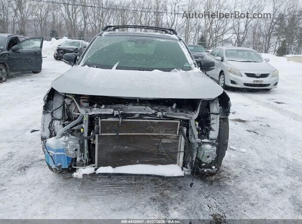 JTMEWRFV0KJ026946 2019 TOYOTA RAV4 HYBRID Серебряный Вид задней части салона