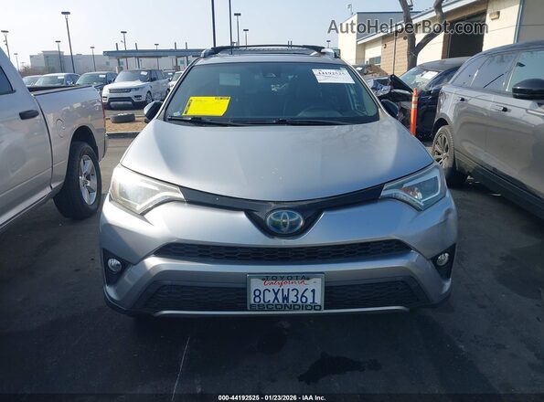 JTMJJREV5JD182041 2018 TOYOTA RAV4 HYBRID Серебряный Вид задней части салона