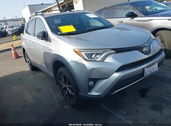 JTMJJREV5JD182041 2018 TOYOTA RAV4 HYBRID Серебряный Передняя правая четверть