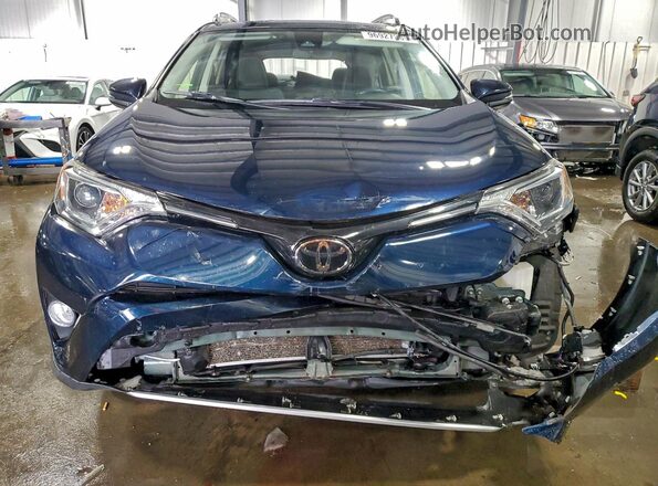JTMWFREV0JJ752827 2018 TOYOTA RAV4 Blue Вид спереду