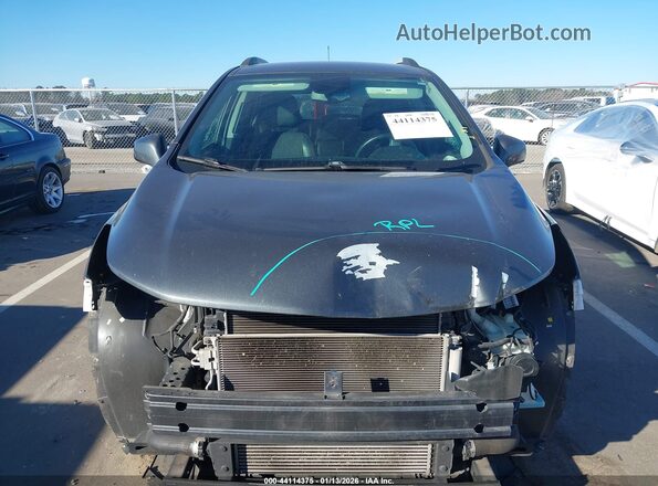 KL7CJPSB0JB560220 2018 CHEVROLET TRAX Серый Вид задней части салона