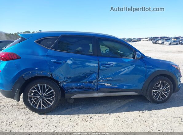 KM8J33AL4MU306487 2021 HYUNDAI TUCSON Blue Rear interior view
