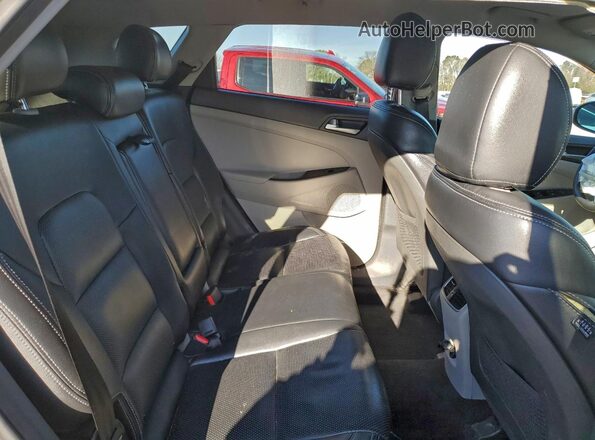 KM8J33ALXMU328364 2021 HYUNDAI TUCSON Silver Rear interior view