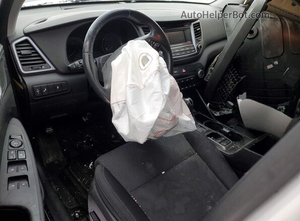 KM8J3CA20GU021586 2016 HYUNDAI TUCSON Белый Вид панели приборов