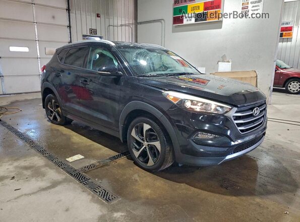 KM8J3CA22GU075438 2016 HYUNDAI TUCSON Черный Передняя правая четверть