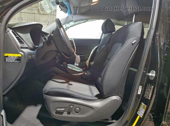 KM8J3CA22GU075438 2016 HYUNDAI TUCSON Черный Вид салона спереди