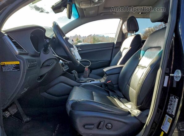 KM8J3CA28GU130880 2016 HYUNDAI TUCSON Черный Вид салона спереди