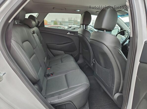 KM8J3CAL4KU905550 2019 HYUNDAI TUCSON White Vista interior trasera