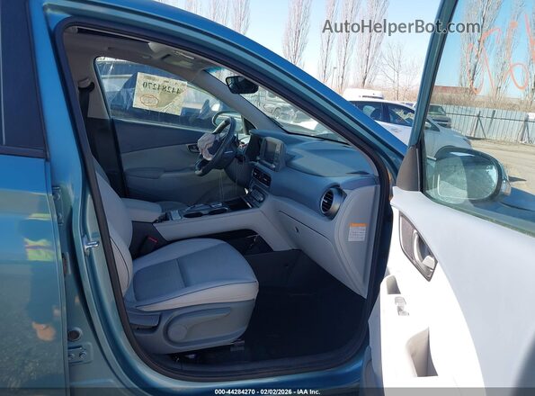 KM8K33AG7KU024672 2019 HYUNDAI KONA EV Бирюзовый Вид салона спереди