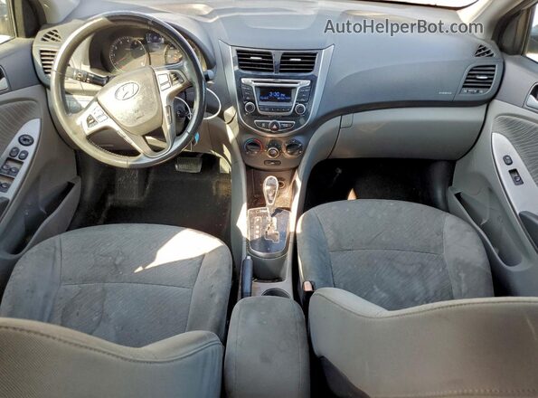 KMHCU4AEXGU161845 2016 HYUNDAI ACCENT Серебряный Вид панели приборов
