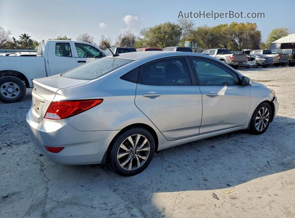 KMHCU4AEXGU161845 2016 HYUNDAI ACCENT Серебряный Задняя правая четверть