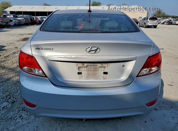 KMHCU4AEXGU161845 2016 HYUNDAI ACCENT Серебряный Вид сзади