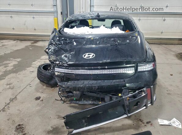 KMHM34AC0RA056631 2024 HYUNDAI IONIQ Черный Вид сзади