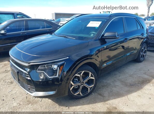 KNDCR3LE5P5041796 2023 KIA NIRO Черный Передняя левая четверть