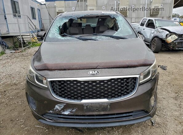 KNDMB5C17G6102609 2016 KIA SEDONA Коричневый Вид спереди