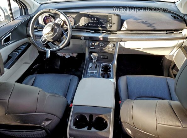 KNDNB4H32P6244147 2023 KIA CARNIVAL Белый Вид панели приборов