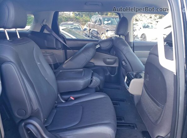 KNDNB5K34T6576955 2026 KIA CARNIVAL Черный Вид задней части салона