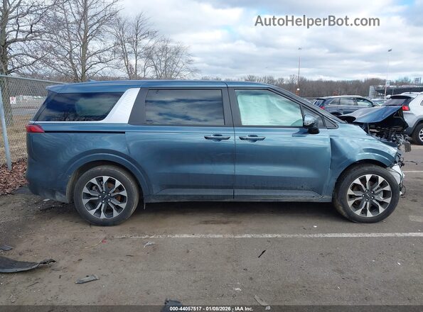 KNDNC5H34R6433579 2024 KIA CARNIVAL MPV Синий Вид задней части салона