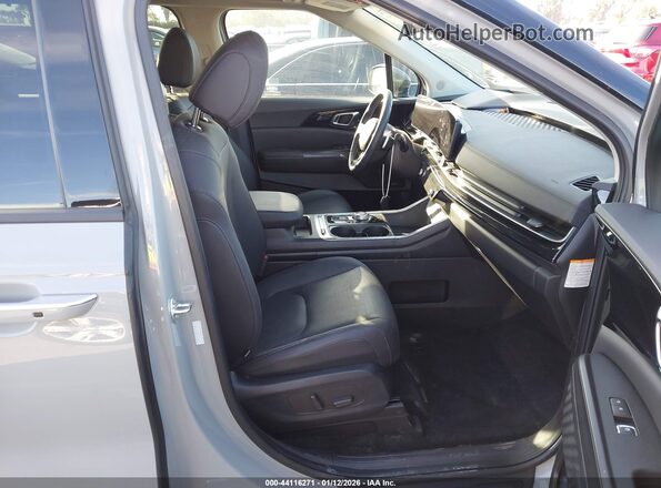 KNDNE5KA5S6038236 2025 KIA CARNIVAL MPV HYBRID Gray Widok wnętrza z przodu