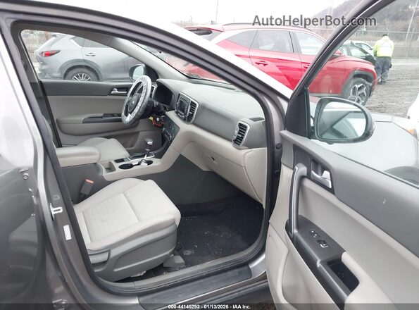 KNDPMCAC1H7237130 2017 KIA SPORTAGE Бежевый Вид салона спереди