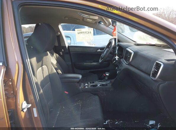 KNDPMCAC4M7861949 2021 KIA SPORTAGE Золотой Вид салона спереди
