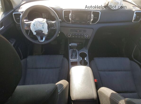 KNDPMCAC7K7556717 2019 KIA SPORTAGE Серебряный Вид панели приборов