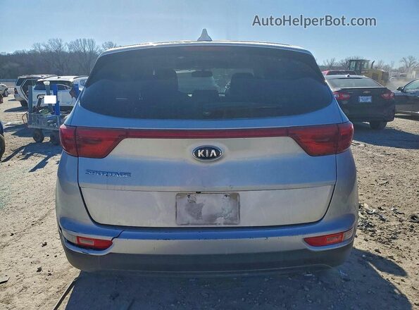 KNDPMCAC7K7556717 2019 KIA SPORTAGE Серебряный Вид сзади