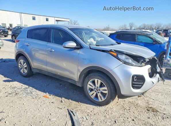 KNDPMCAC7K7556717 2019 KIA SPORTAGE Серебряный Передняя правая четверть