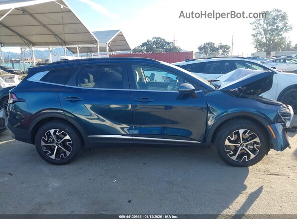 KNDPVCDG6S7208578 2025 KIA SPORTAGE HYBRID Dark Blue Вид задней части салона