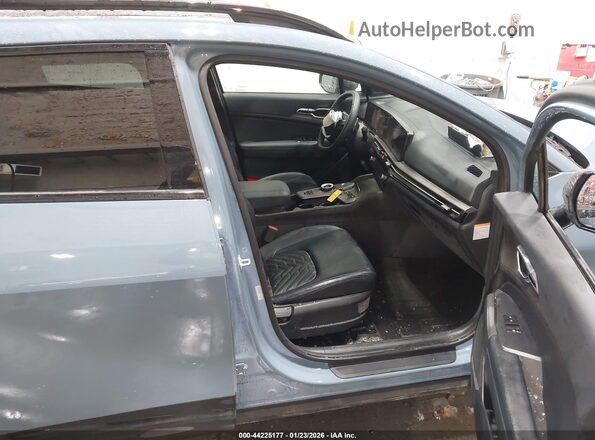 KNDPVDDG1T7278335 2026 KIA SPORTAGE HYBRID Синий Вид салона спереди