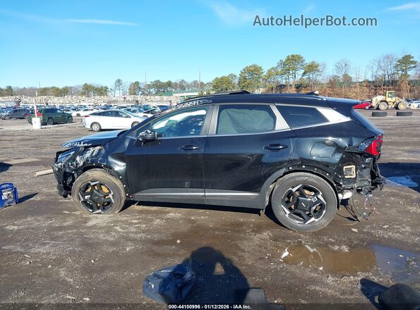 KNDPVDDG8T7286383 2026 KIA SPORTAGE HYBRID Black Widok wnętrza z tyłu