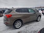 2018 Buick Envision Premium Коричневый vin: LRBFX3SX0JD010196