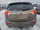 2018 Buick Envision Premium Коричневый vin: LRBFX3SX0JD010196