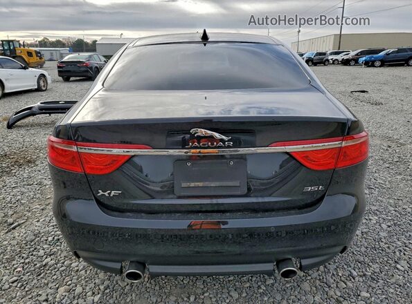 SAJBE4BV7GCY13100 2016 JAGUAR XF Черный Вид сзади