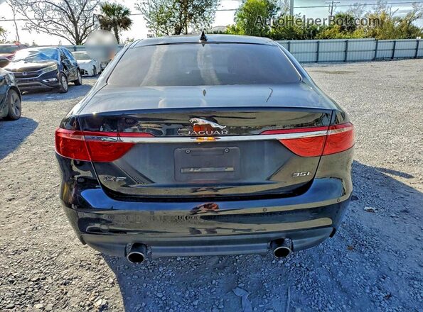 SAJBE4BV8GCY14014 2016 JAGUAR XF Black Widok z tyłu