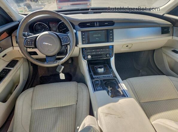 SAJBE4BV9GCY10165 2016 JAGUAR XF Синий Вид панели приборов
