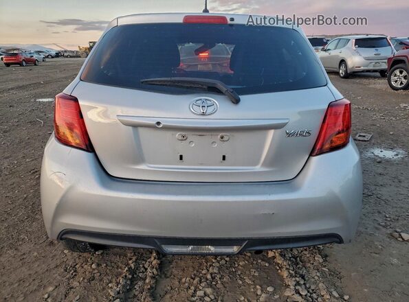 VNKKTUD30GA065907 2016 TOYOTA YARIS Silver Vista trasera