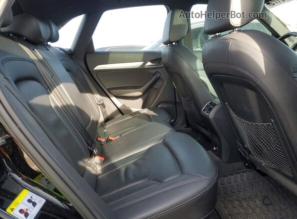 WA1GFCFS0GR000104 2016 AUDI Q3 Black Vista de los asientos traseros