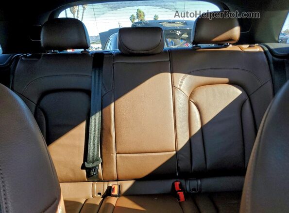 WA1GFCFS6GR017473 2016 AUDI Q3 White Vista de los asientos traseros