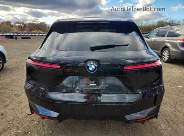 WB523CF00PCM73863 2023 BMW IX Black Rear view