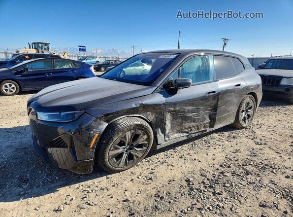 WB523CF02PCL59041 2023 BMW IX Black წინა მარცხენა ხედი სამი მეოთხედიდან