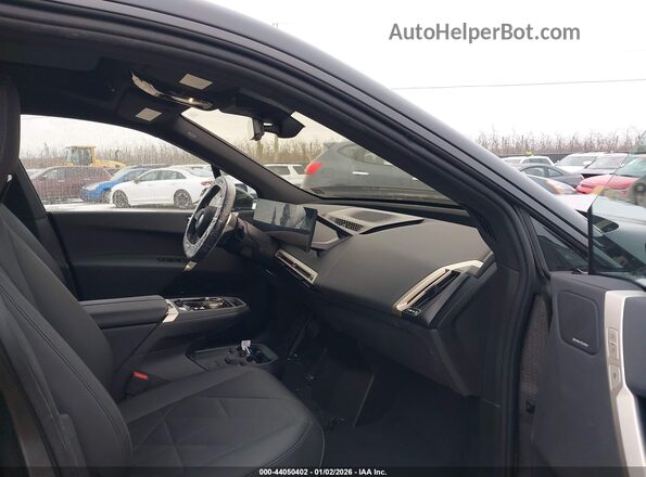 WB523CF04RCN76514 2024 BMW IX Black Widok wnętrza z przodu