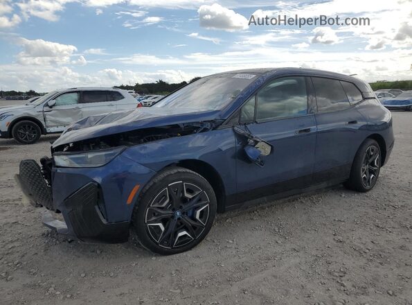 WB523CF04SCS31330 2025 BMW IX Синий Передняя левая четверть