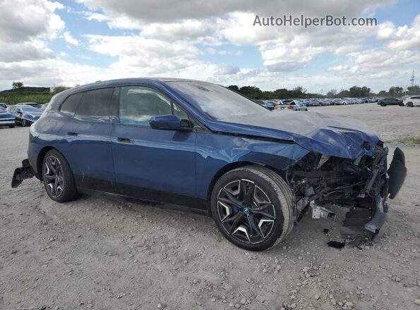 WB523CF04SCS31330 2025 BMW IX Синий Передняя правая четверть