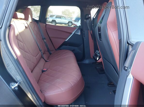 WB533CF03SCS28505 2025 BMW IX Black Vista de la etiqueta del VIN