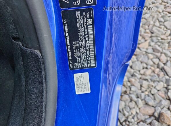 WBA13AR04MCG09469 2021 BMW M4 Blue Engine compartment view