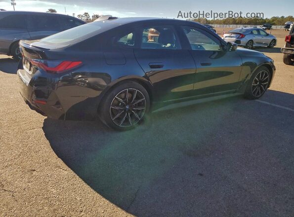 WBA13AW06RFT28197 2024 BMW M4 Черный Задняя правая четверть