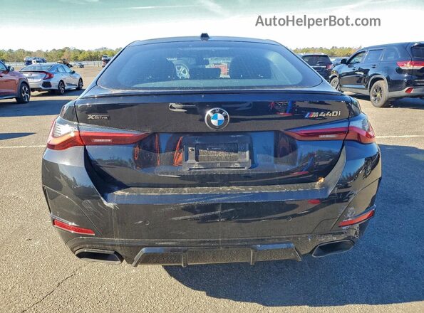 WBA13AW06RFT28197 2024 BMW M4 Черный Вид сзади